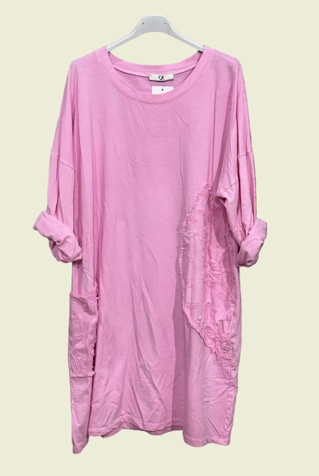 Pink dress on a hanger