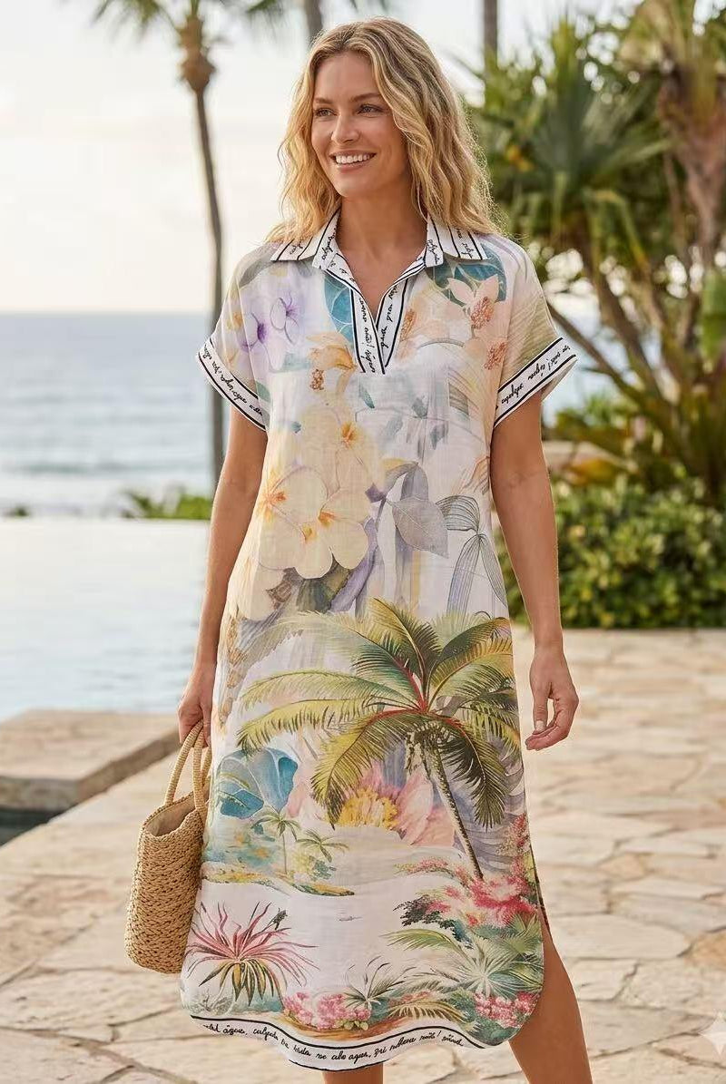 Woman wearing a floral dress by a poolside with palm trees in the background