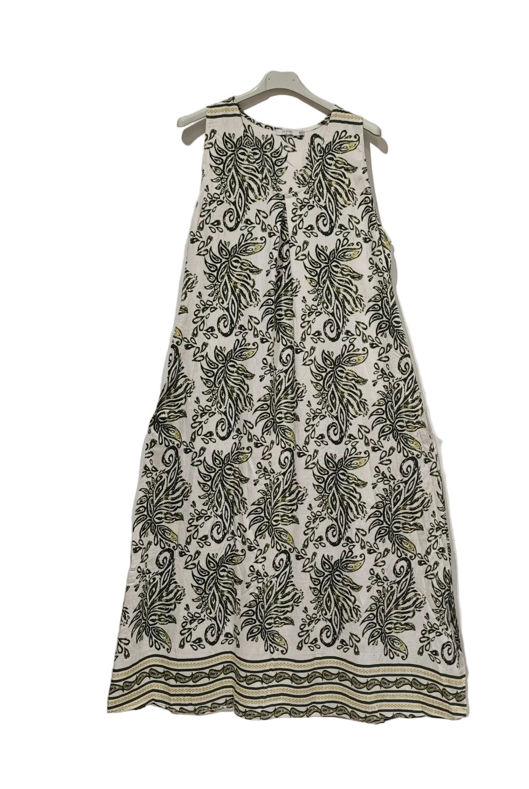 White dress with khaki floral pattern on a hanger against a white background