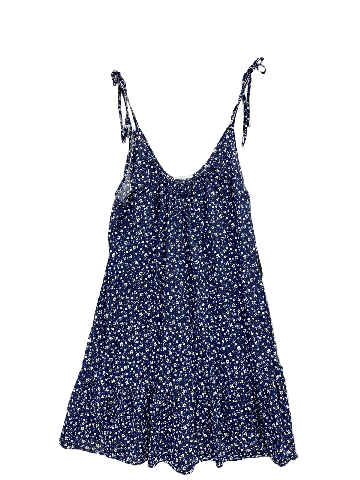 A navy blue sleeveless slip dress with a small white floral print