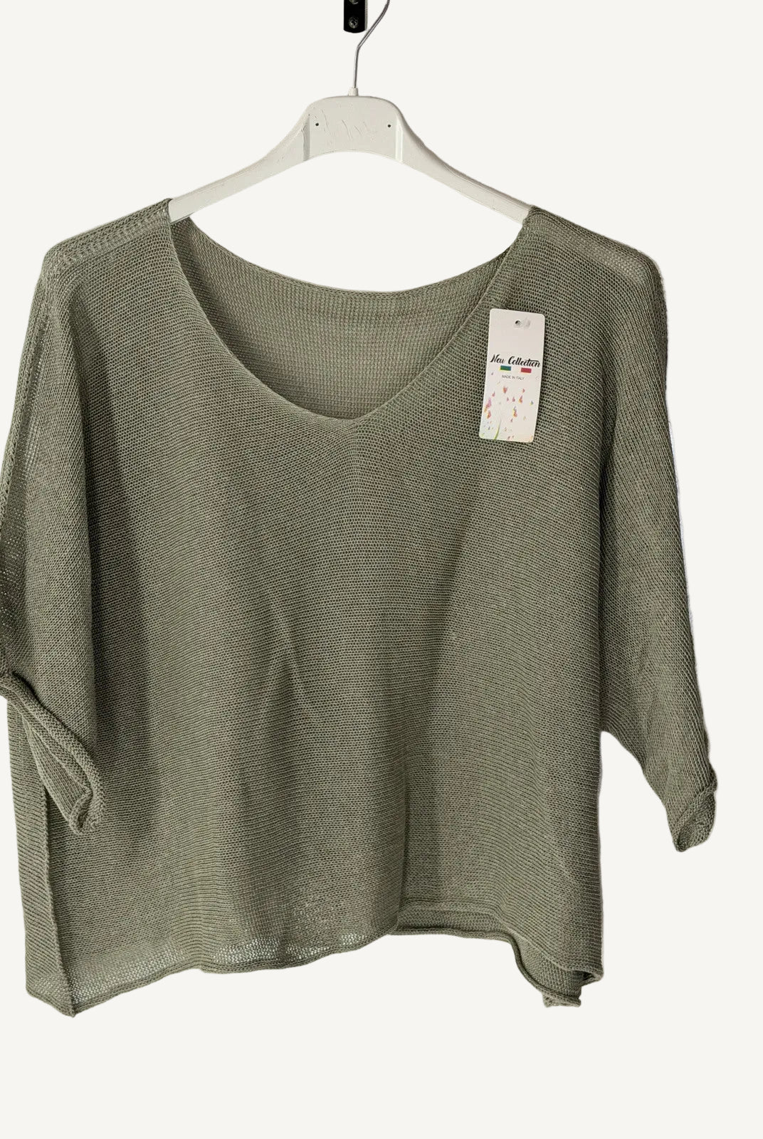 Green sweater on a hanger with
v neck