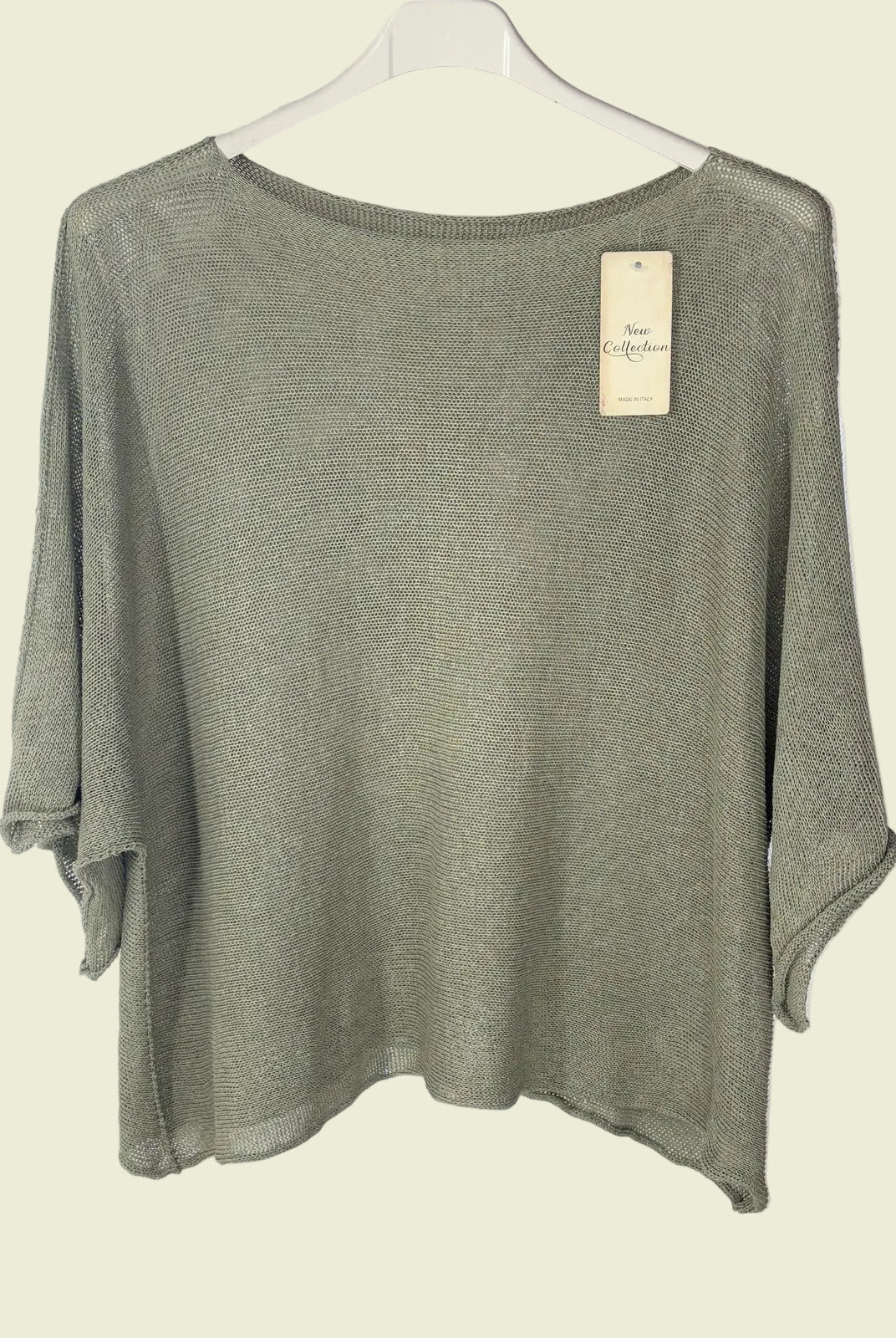 Khaki Green sweater on a hanger