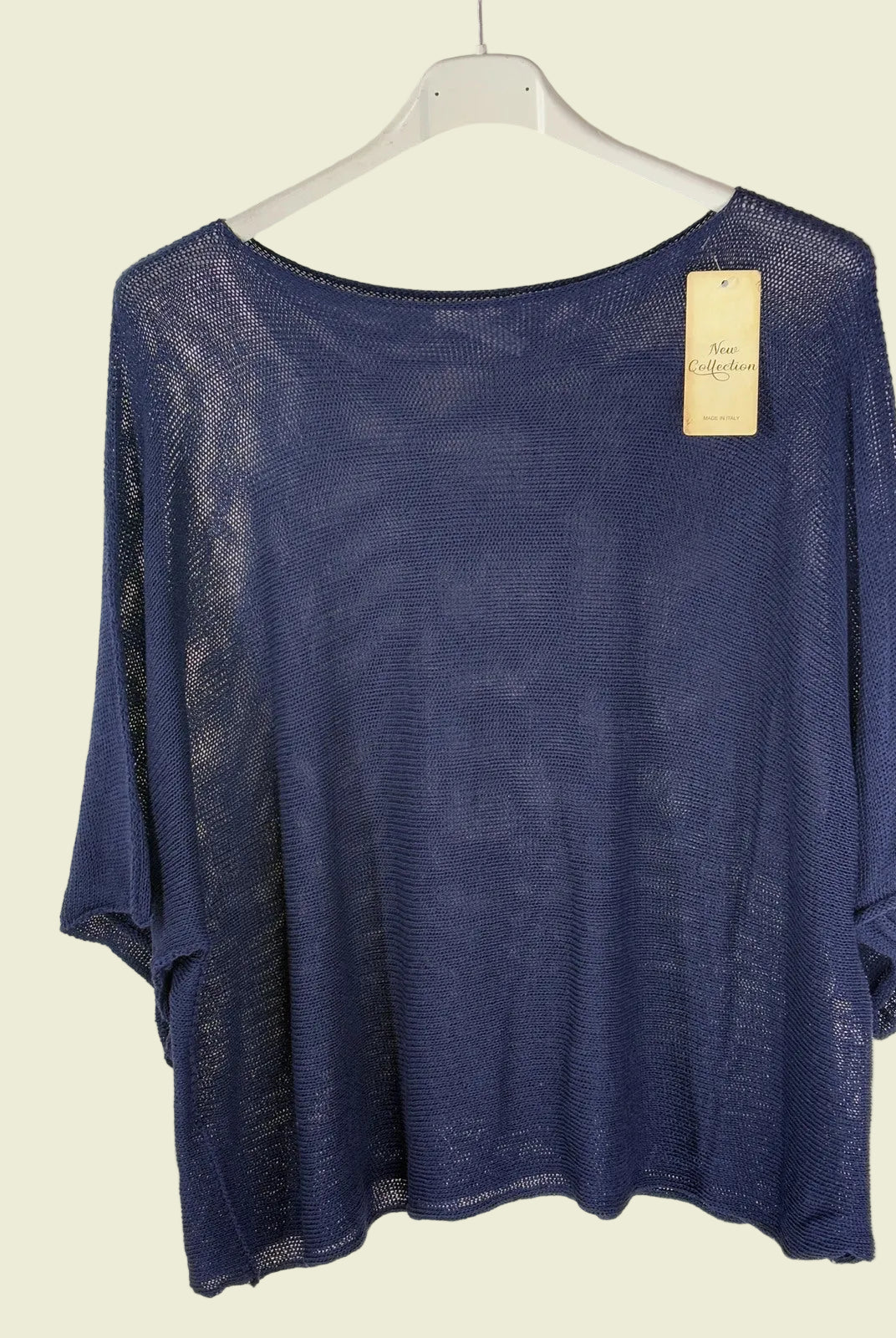 Blue top on a hanger