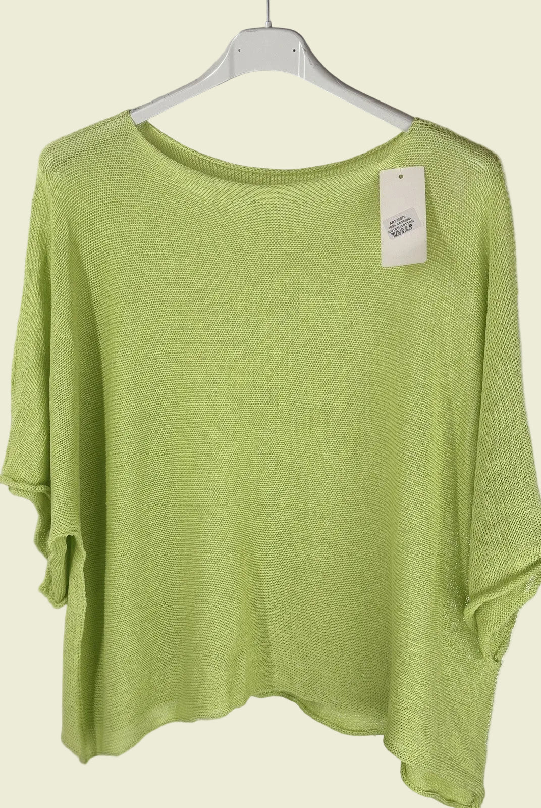 Light Green sweater on a hanger