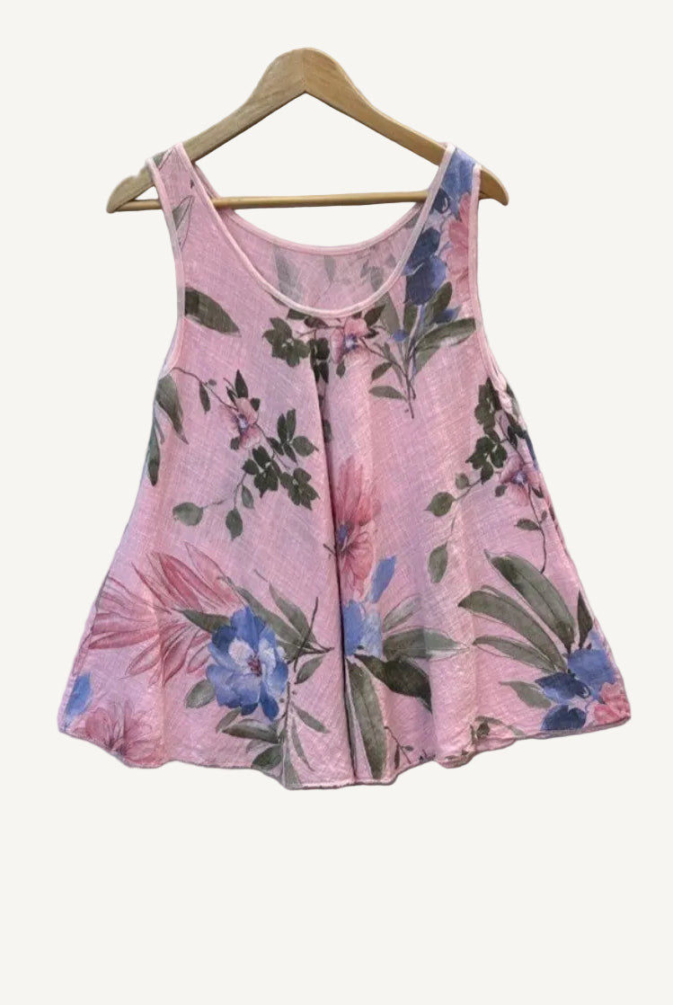 Pink floral sleeveless top on a hanger