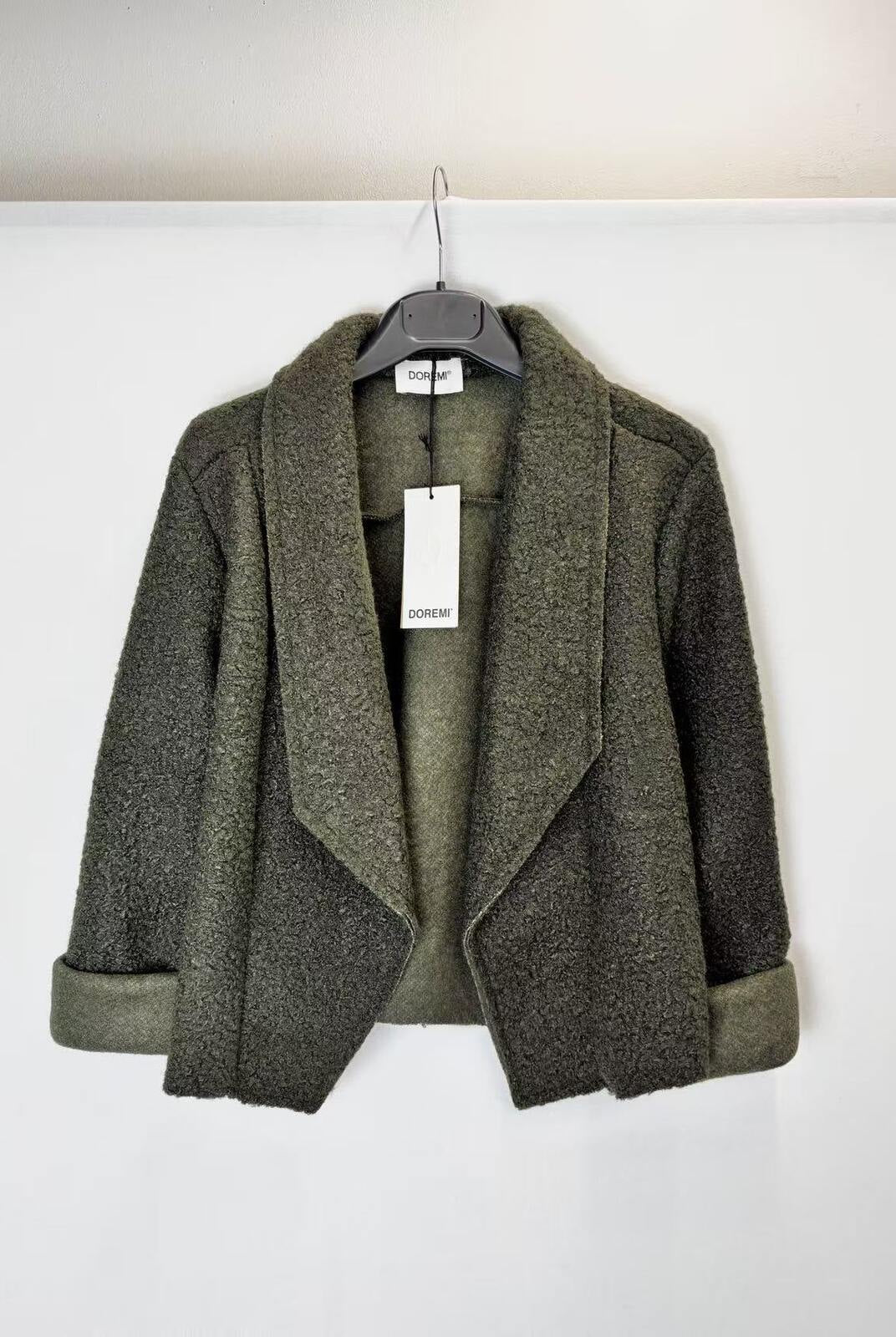 A dark olive green textured open-front jacket with wide lapels