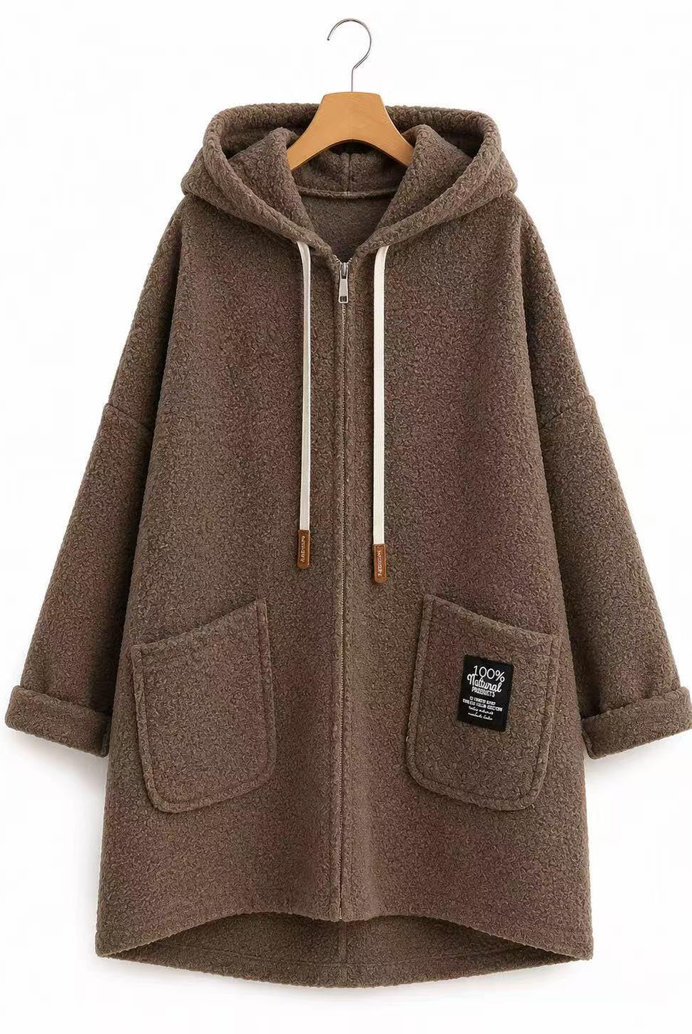 A brown fuzzy zip-up hooded jacket with white drawstrings, displayed on a wooden hanger against a plain white background.