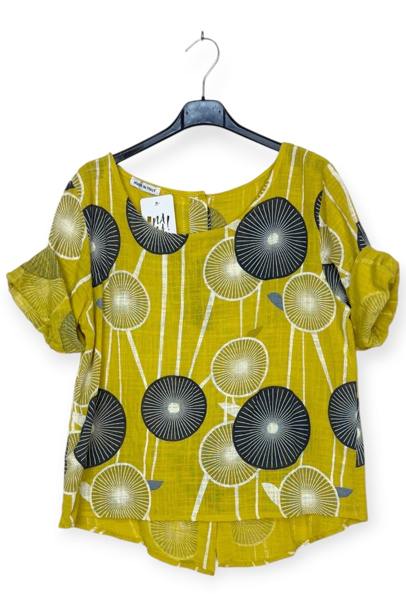Yellow blouse with black and white pattern