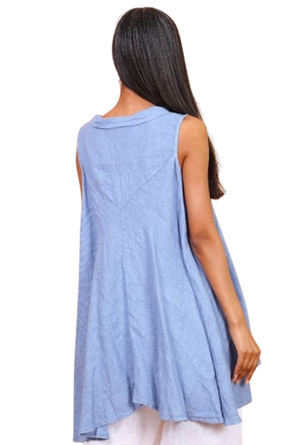 A woman wearing a sky blue sleeveless cowl neck top with an asymmetrical hem, paired with white trousers.