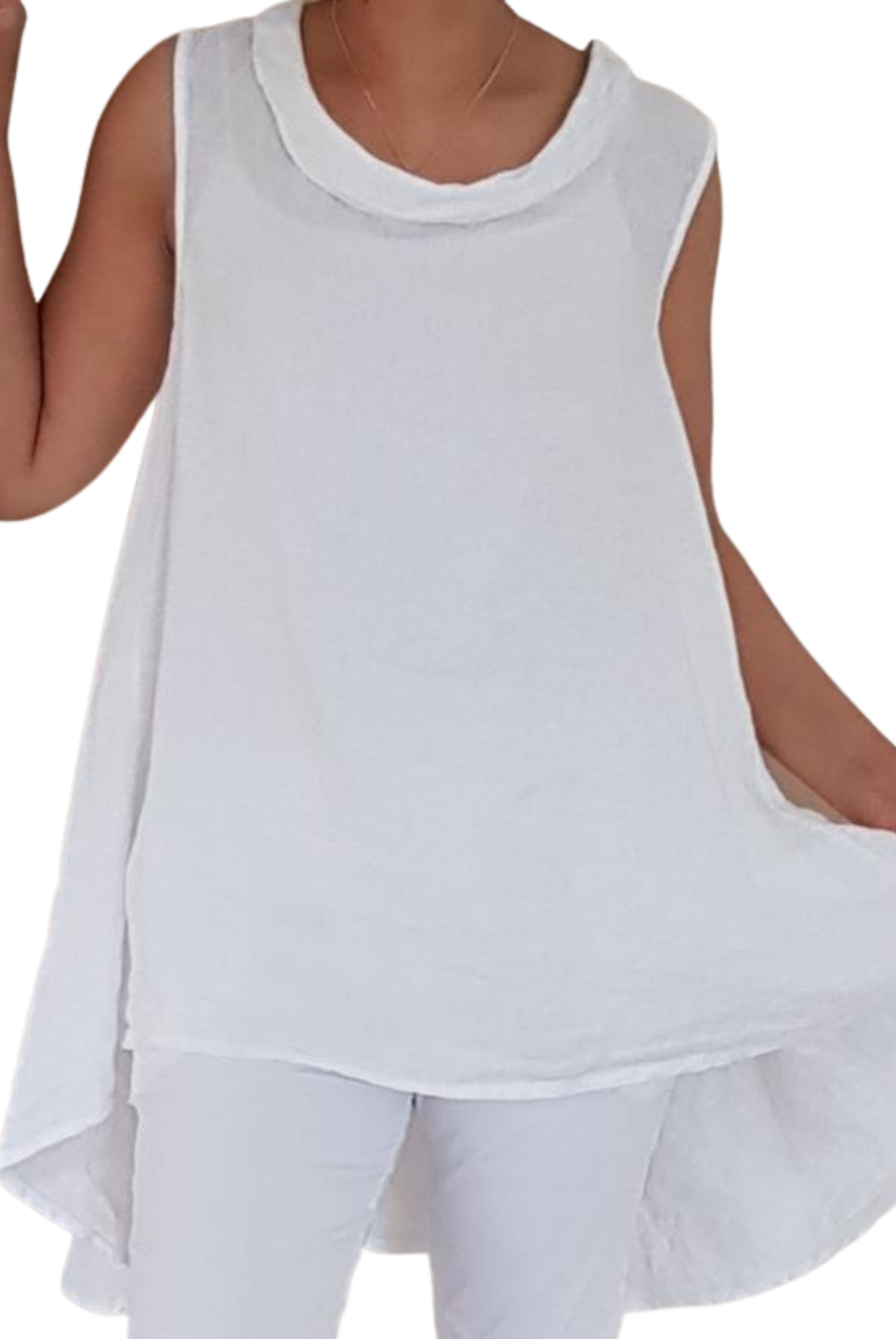 A woman wearing a white sleeveless cowl neck top with an asymmetrical hem, paired with white trousers.