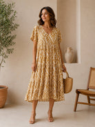 Vanilla colour midi dress tiered with v neck and short sleeves