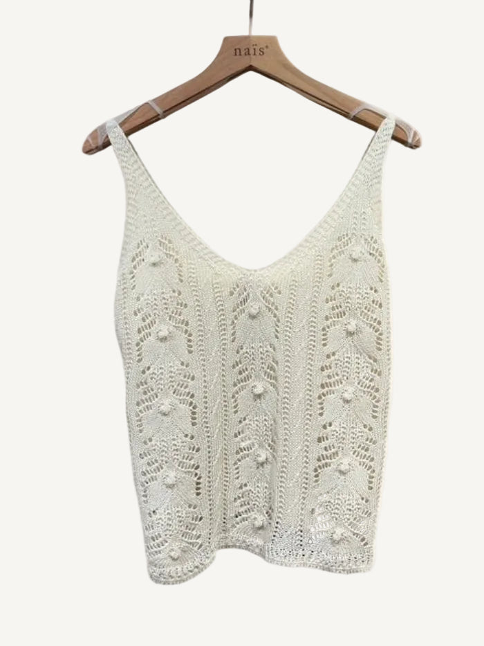 Beige crochet tank top on a hanger
