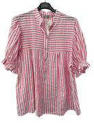 Coral and white striped shirt on a hanger against a white background