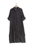 Dark gray dress on a hanger against a white background