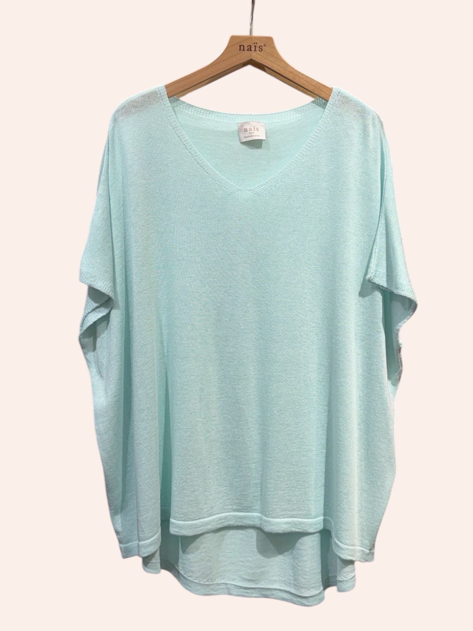 vert d'eau sweater  on a hanger