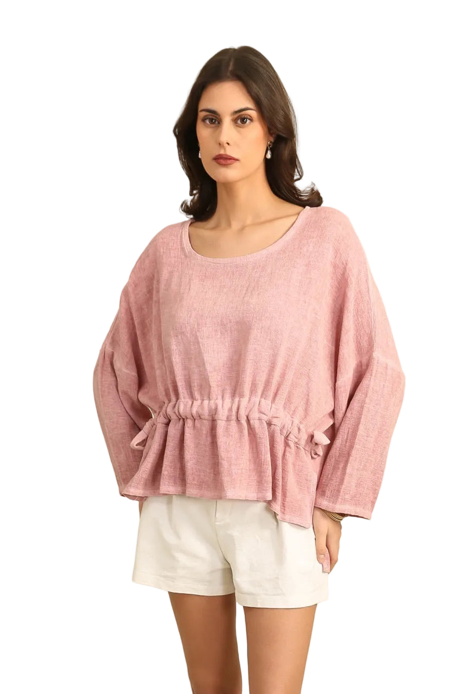 Woman wearing a pink top and white shorts on a white background