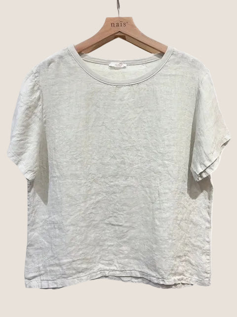 Beige t-shirt on a wooden hanger against a white background