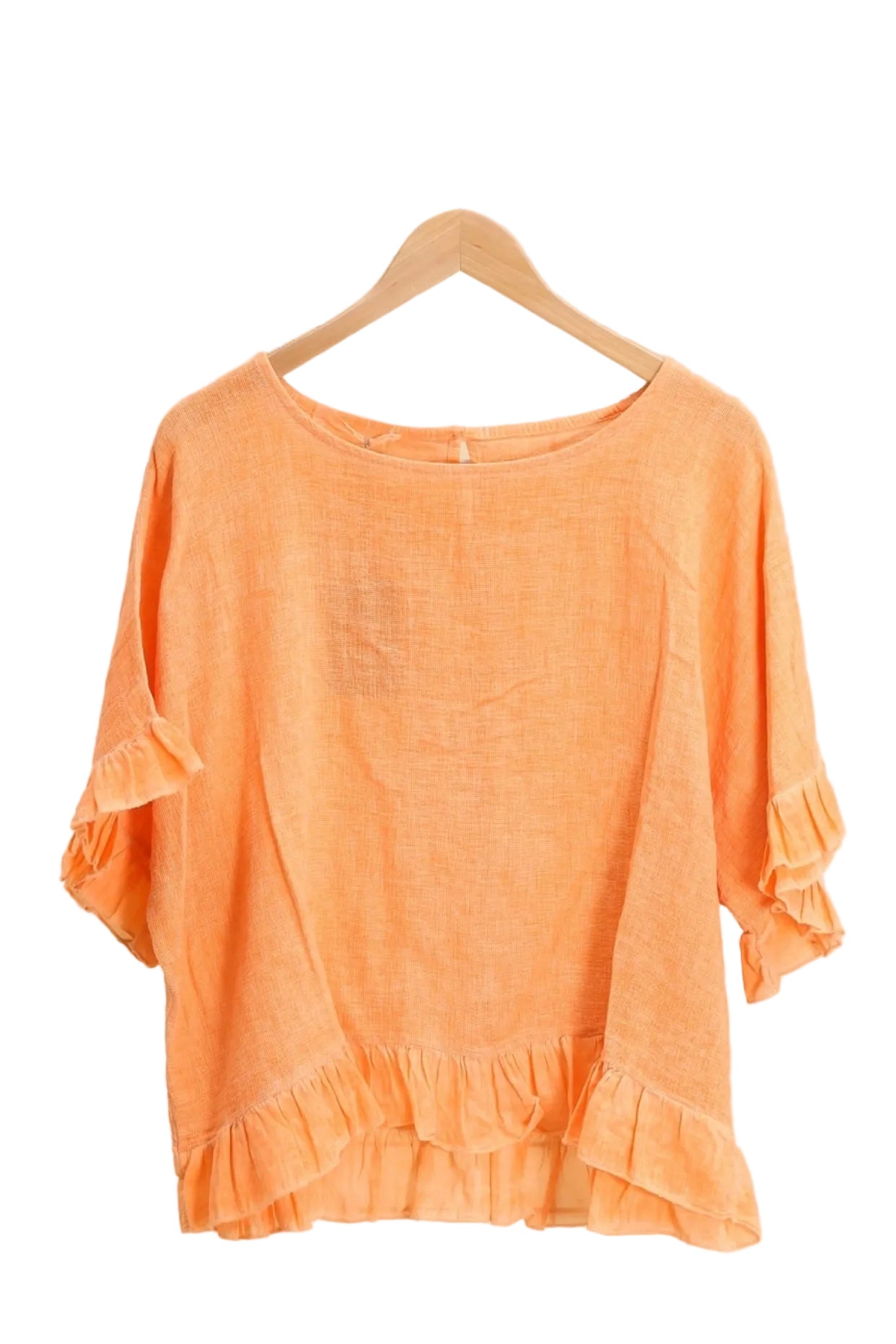Orange ruffled blouse on a white background