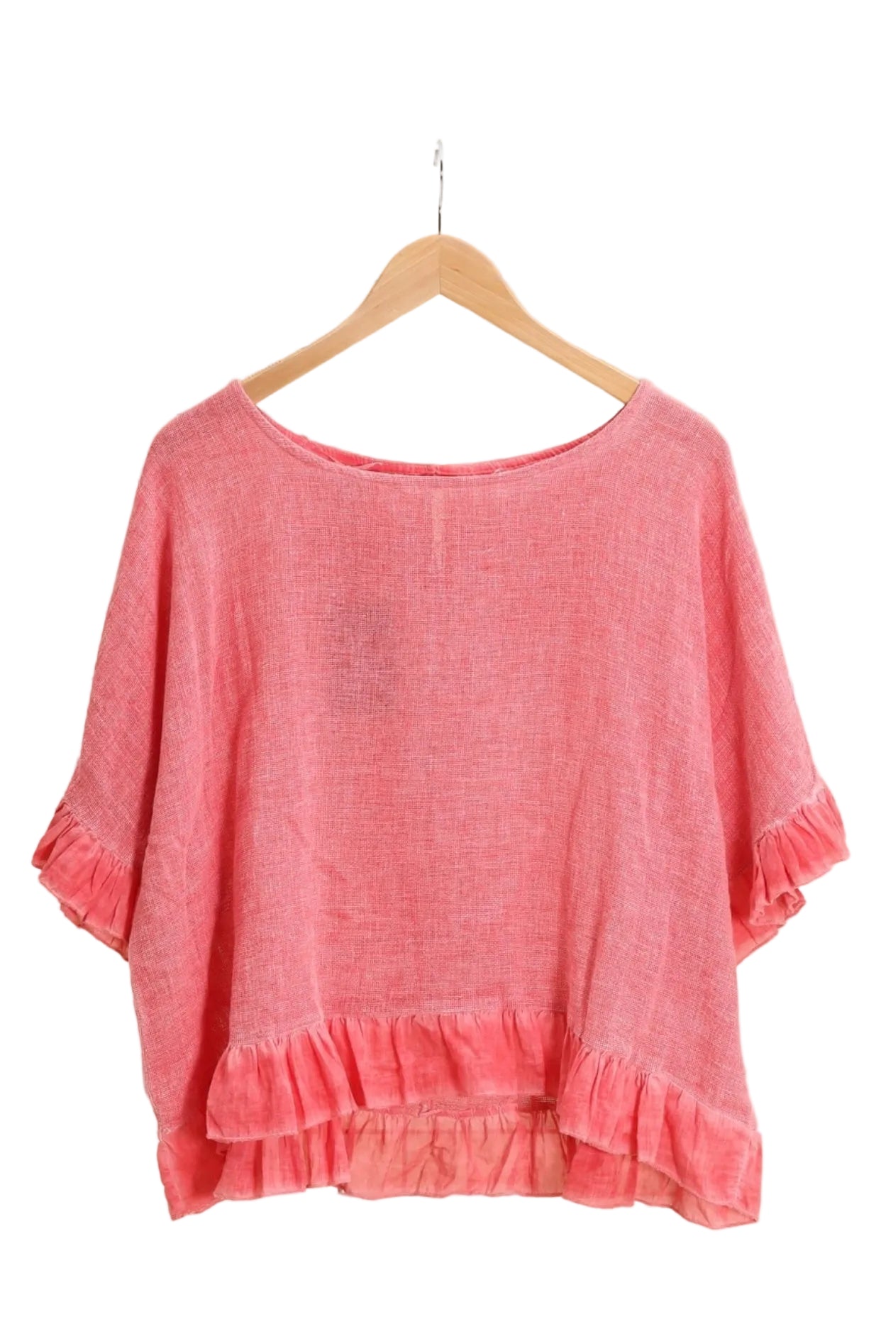 Coral ruffled blouse on a white background