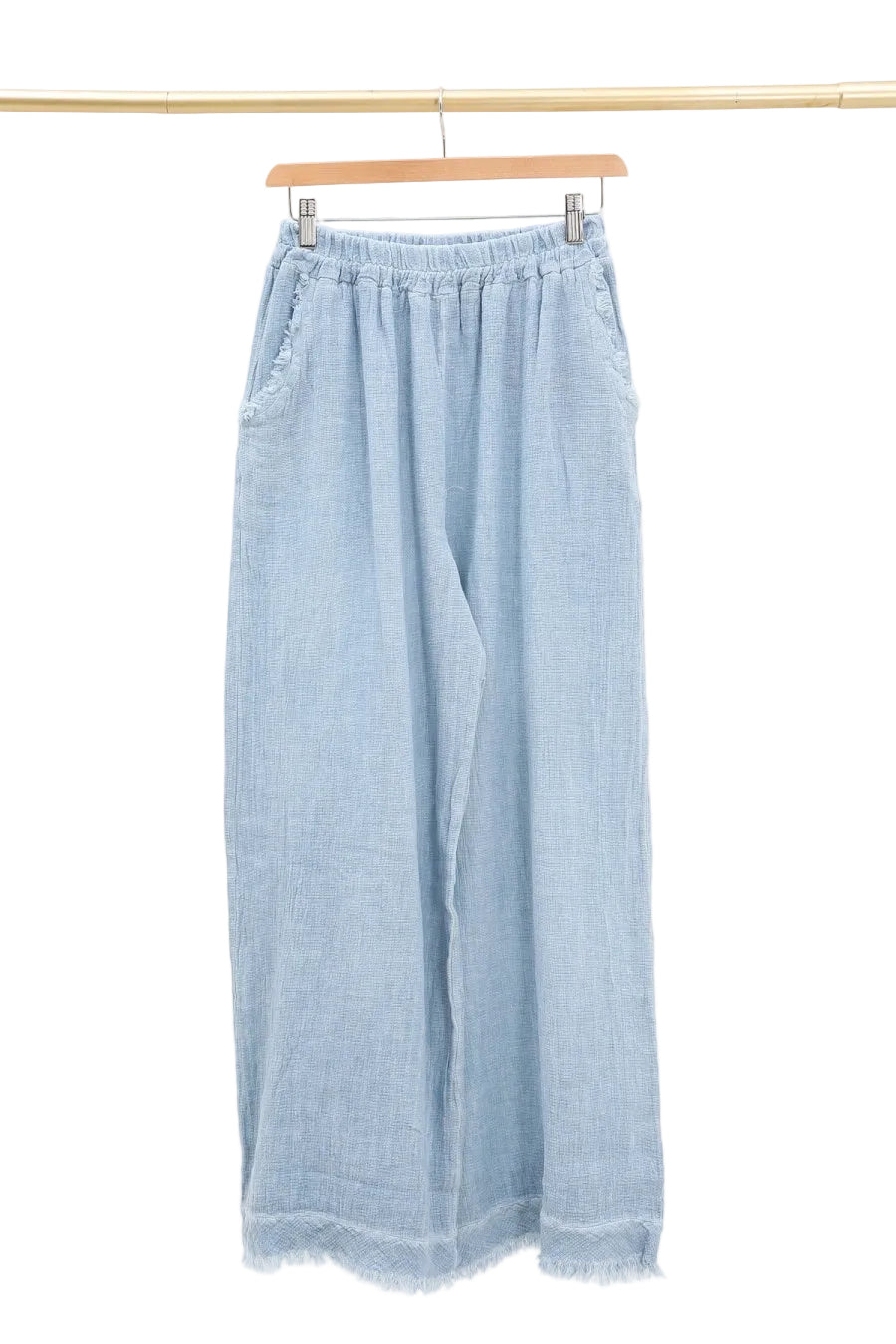 Light blue denim wide-leg pants on a hanger against a white background