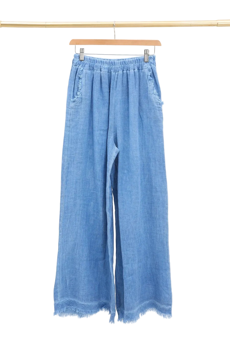 Blue denim wide-leg pants on a hanger against a white background