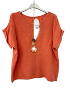 orange short sleeved top