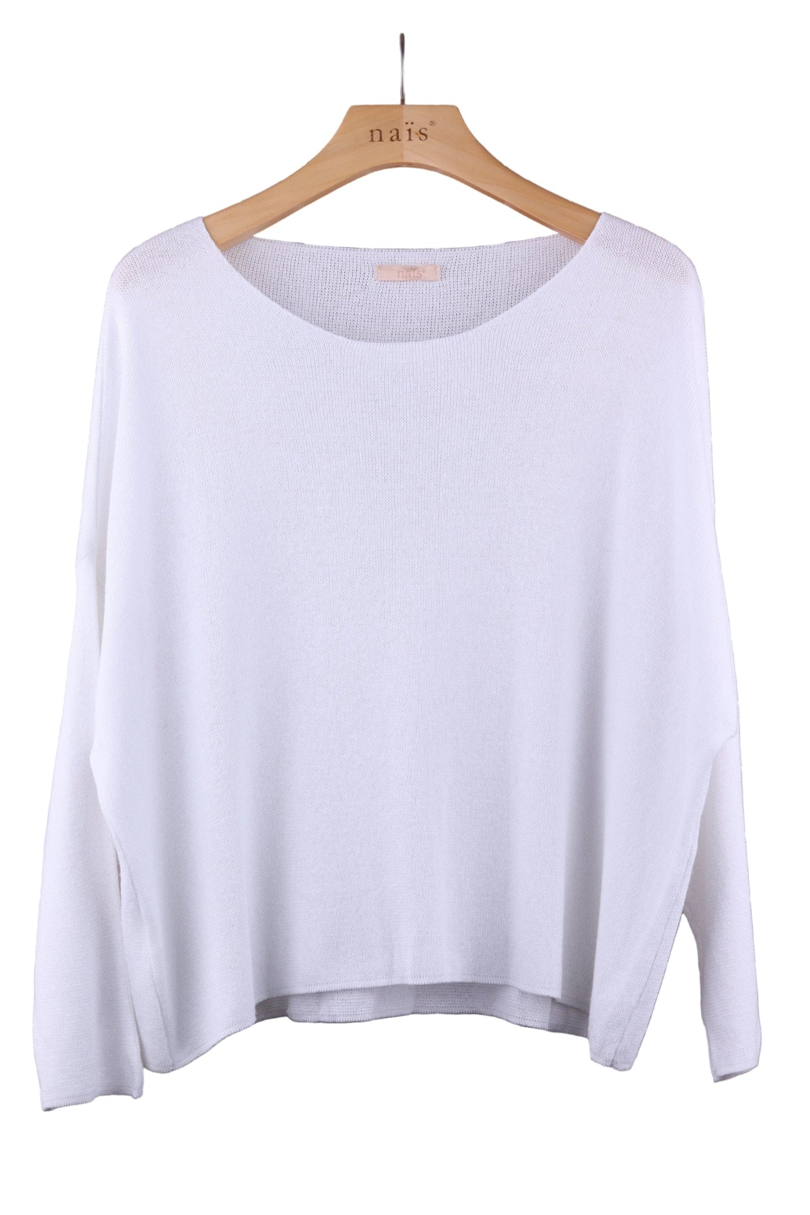 White sweater on a wooden hanger against a white background