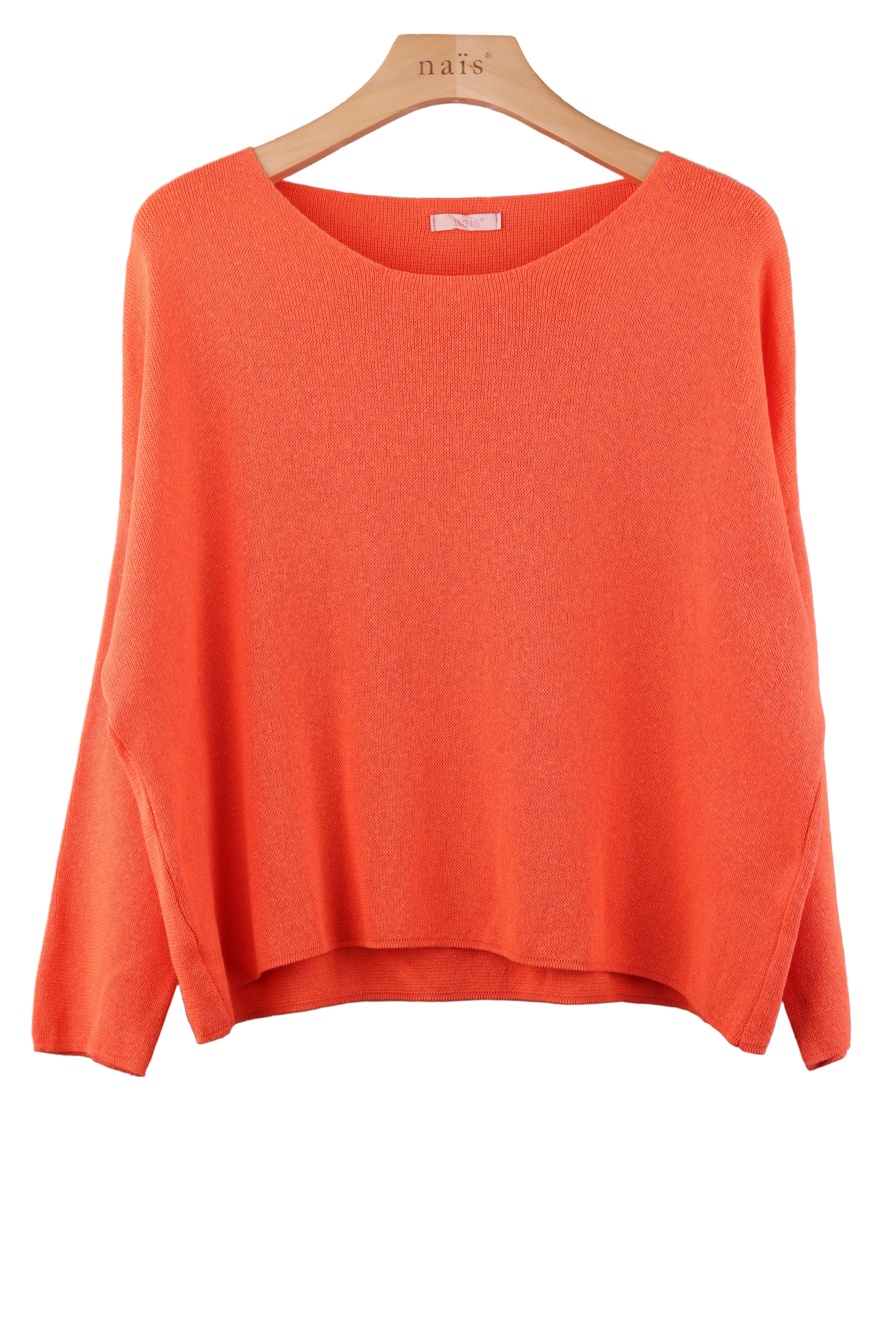 Orange sweater on a hanger against a white background