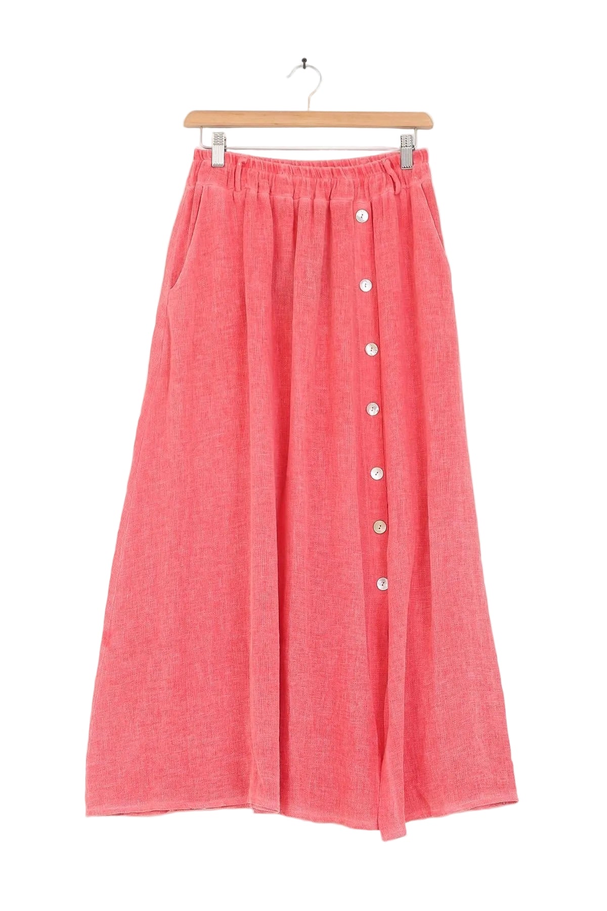 Coral skirt with button details on a white background