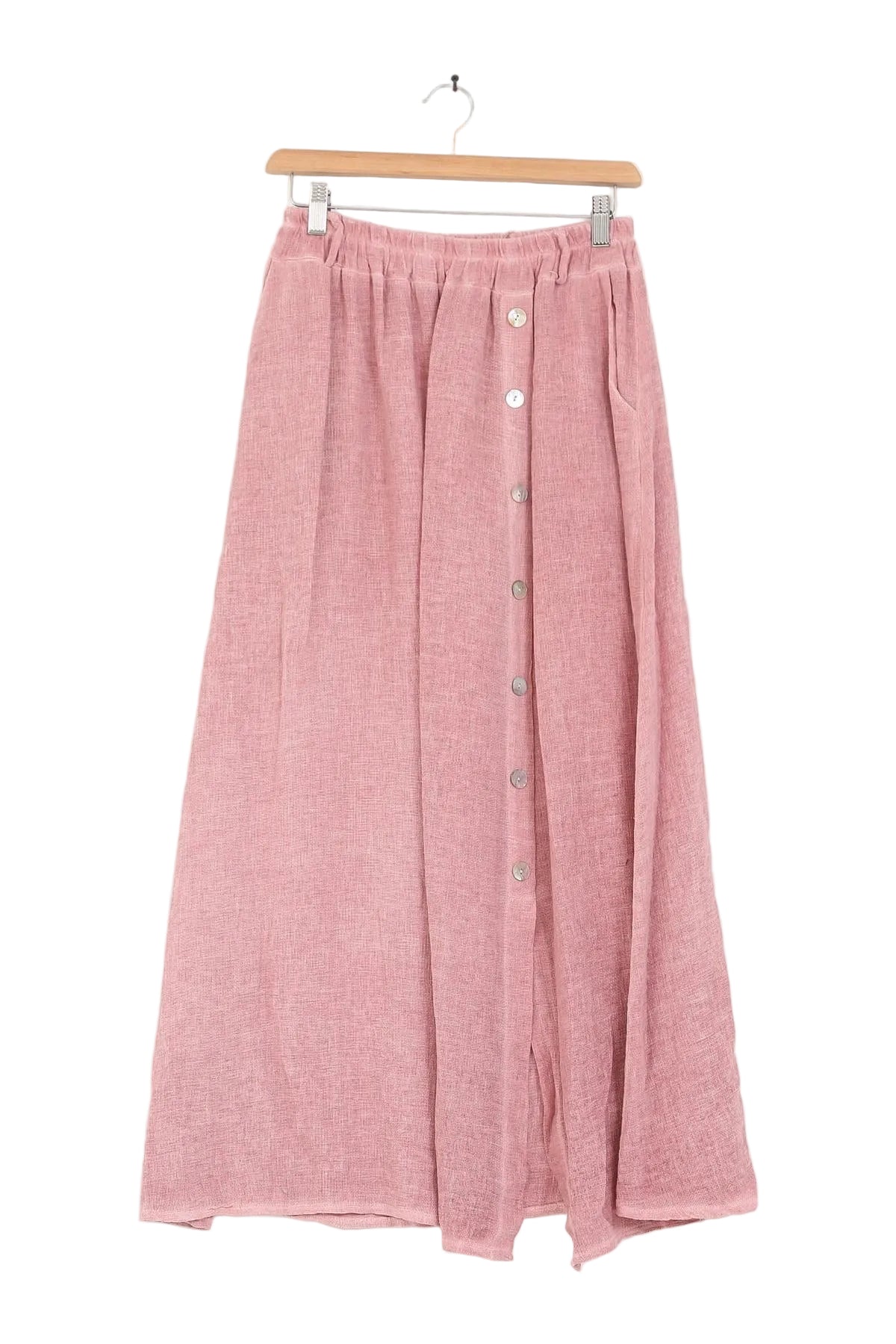 Pink skirt on a hanger against a white background