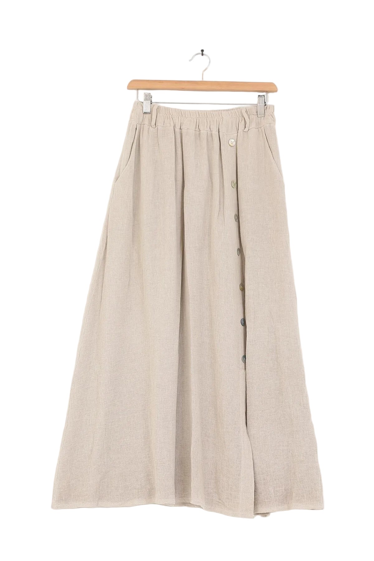 Beige skirt on a hanger against a white background