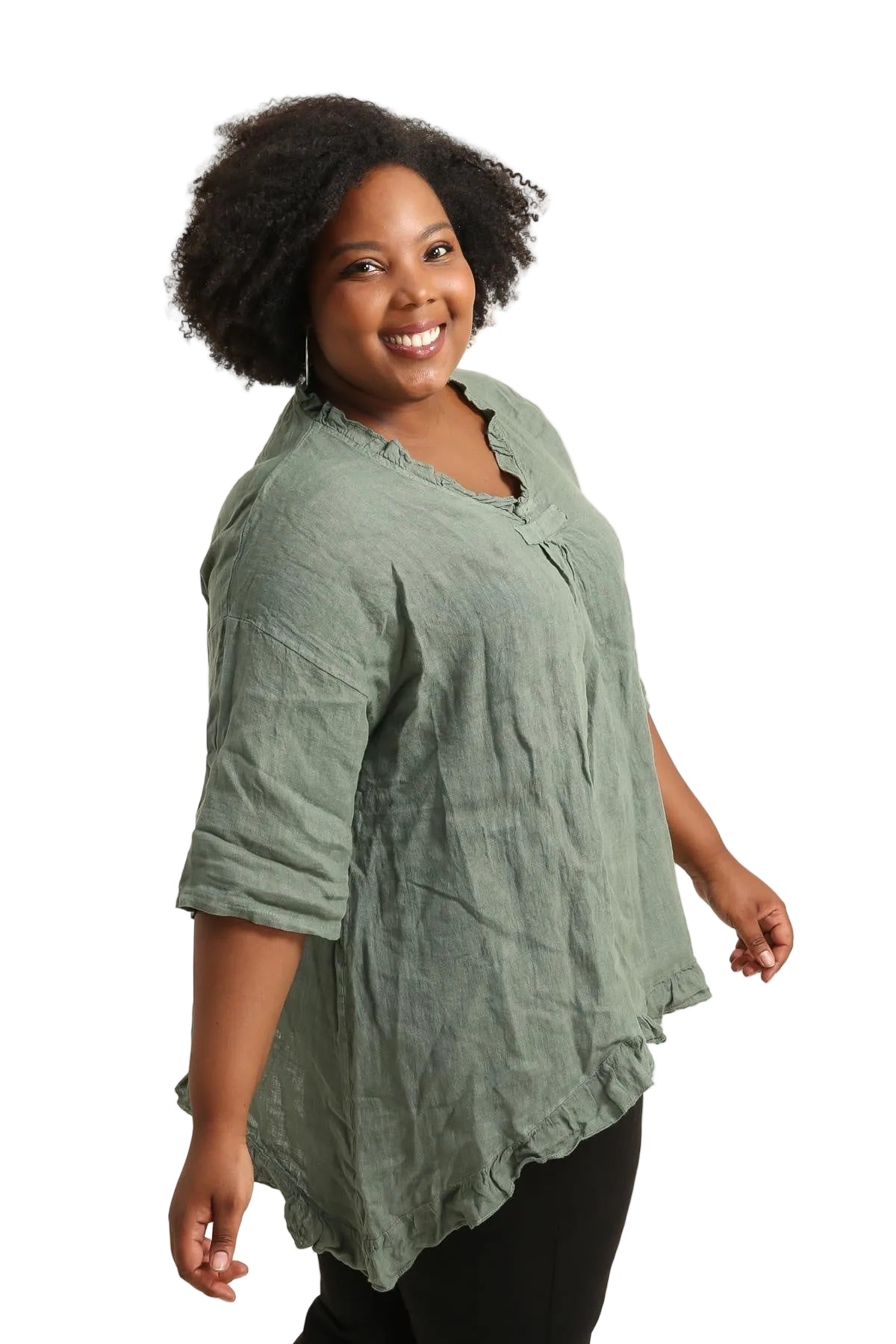 Woman wearing a green blouse against a white background
