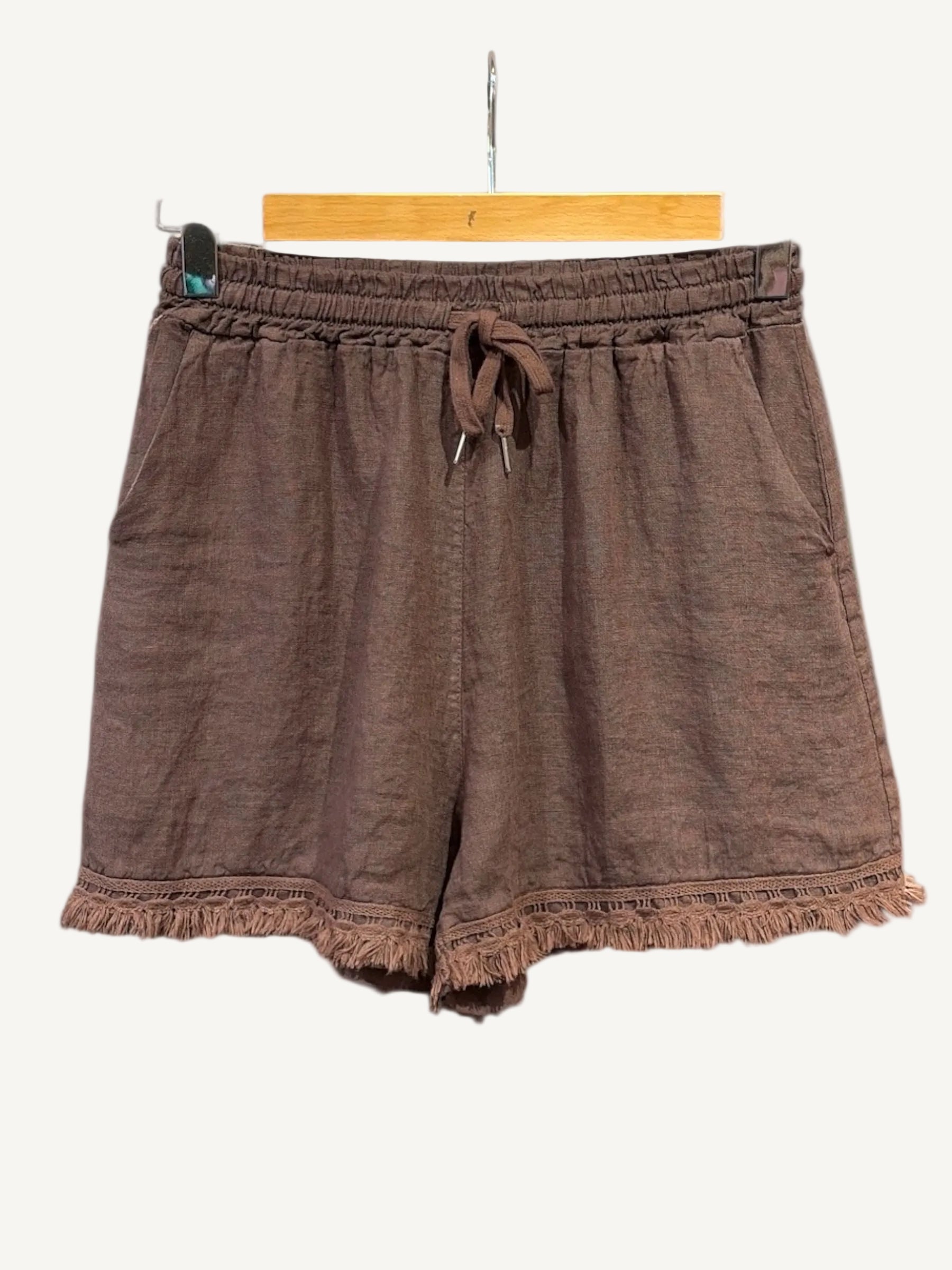 Brown linen shorts with fringe detail