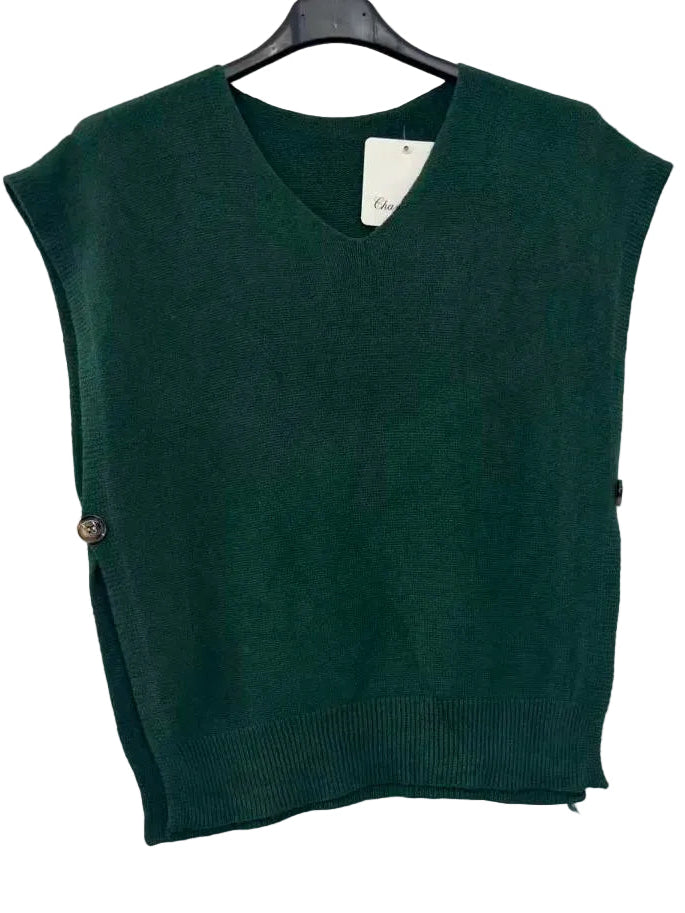 A forest green sleeveless knit sweater vest with a V-neck, hanging on a black hanger against a plain white wall.