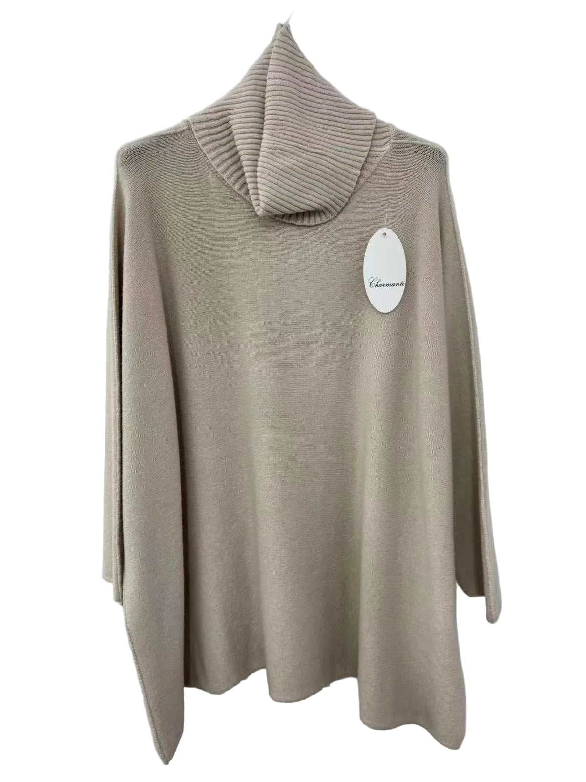 A beige knit turtleneck sweater with a ribbed mock neck collar, hanging on a white wall with a white product tag attached.