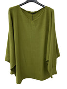 An olive green knit top with a wide V-neck and batwind sleeves,