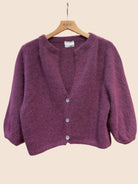 A prune coloured cardigan with 3/4 sleeves and v neck in an angora mix