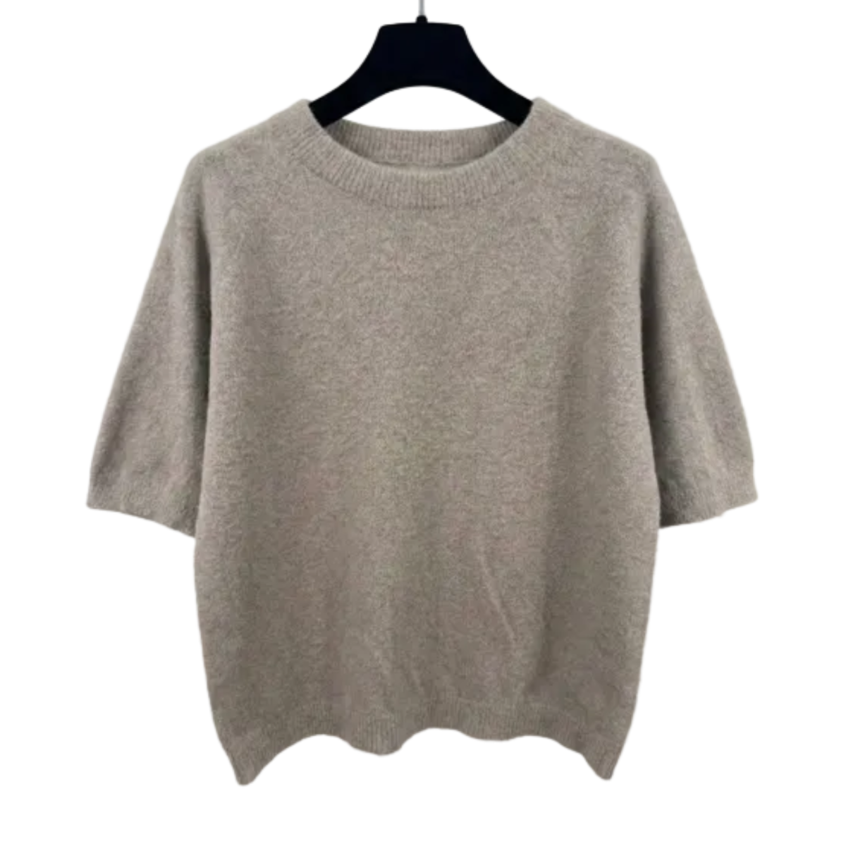 Beige sweater on a hanger against a white background