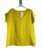 Yellow tank top on a hanger against a white background