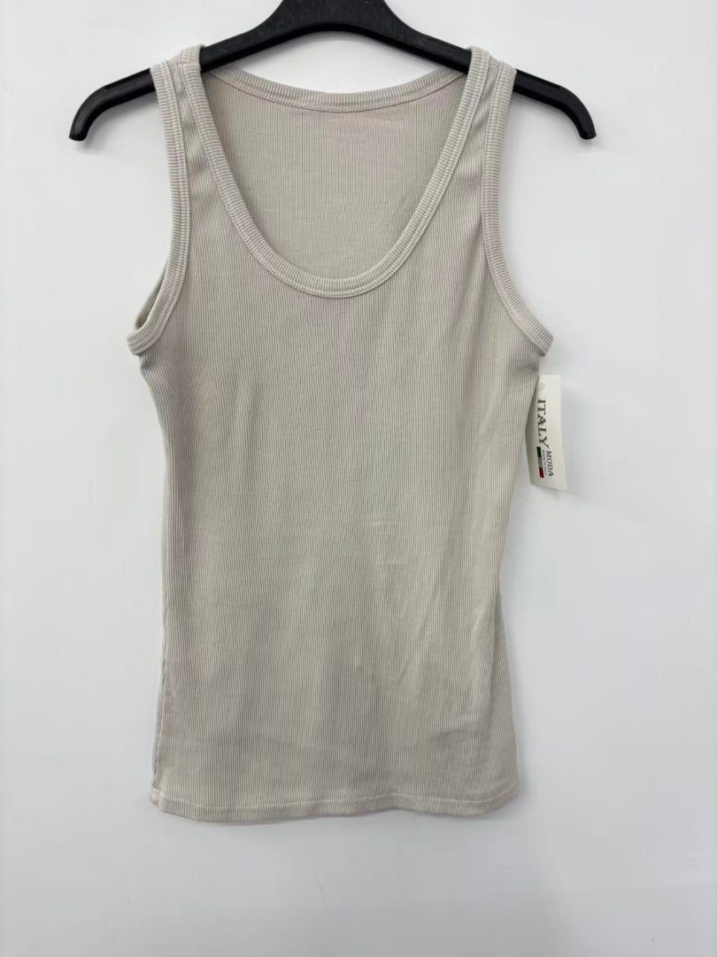 Beige tank top on a hanger against a white background