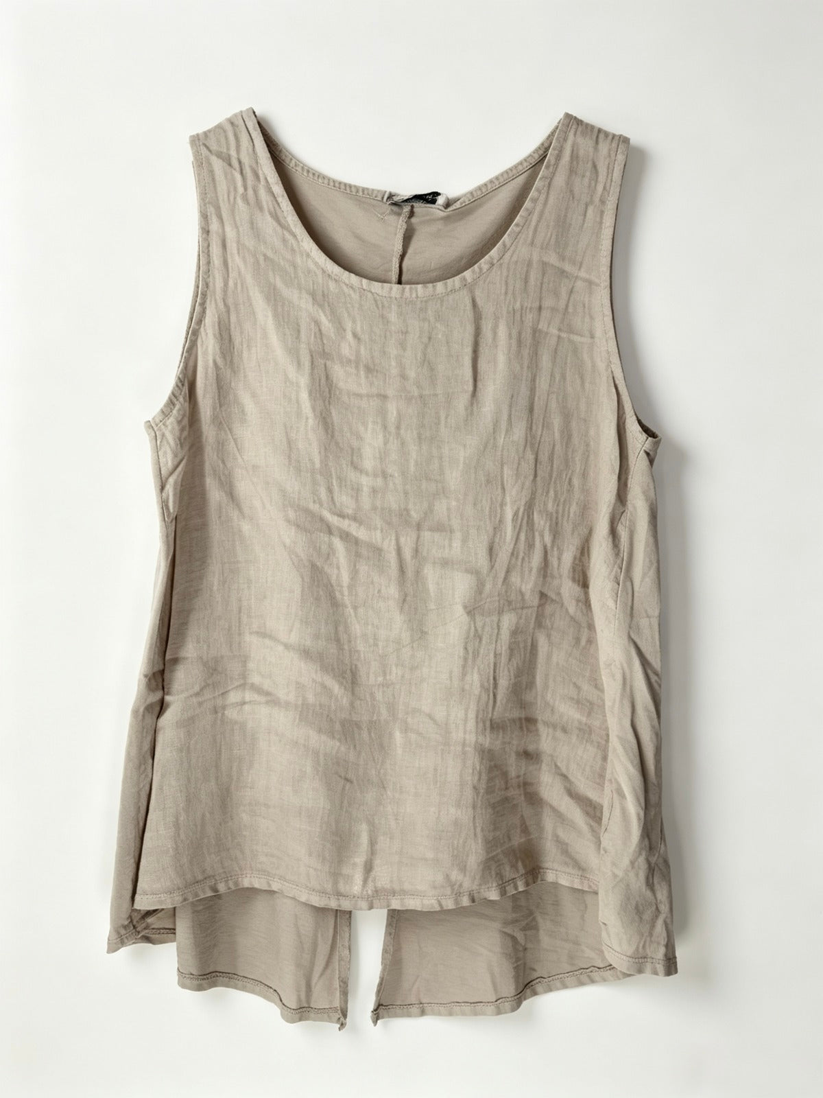 Beige sleeveless top on a white background