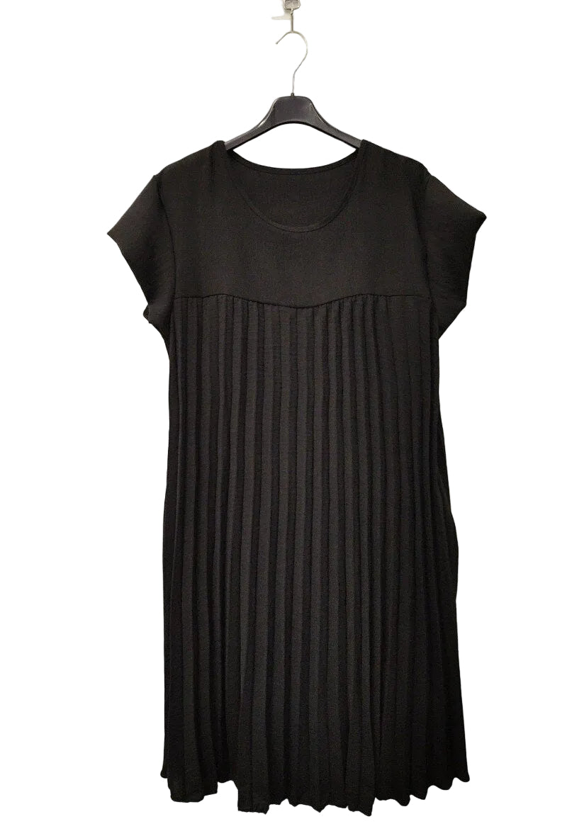 black pleated dress on plain background