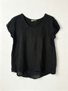 Black linen top on a white background