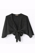 Black bolero with a tie front on a white background