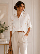 white embroidered shirt