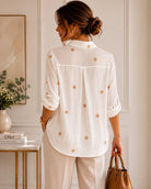 back view of white embroidred shirt