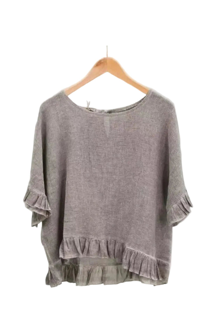 Chocolate ruffled blouse on a white background