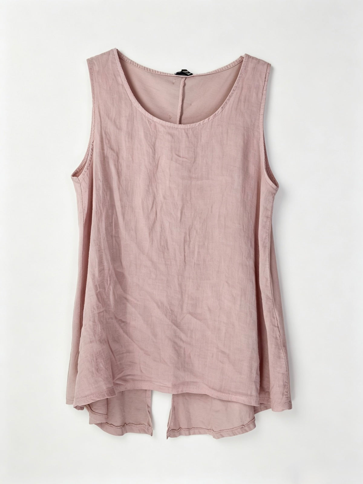 Pink sleeveless top on a white background