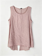 Pink sleeveless top on a white background