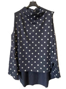 A navy blue long-sleeve top with white polka dots